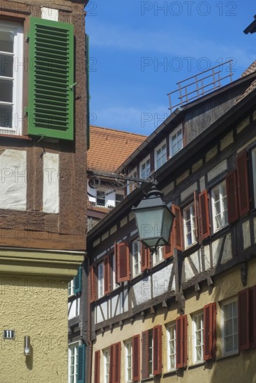 Typical old town scene, half-timbered houses, old street lamp, light, shutters, idyll, Tübingen, Baden-Württemberg, Germany