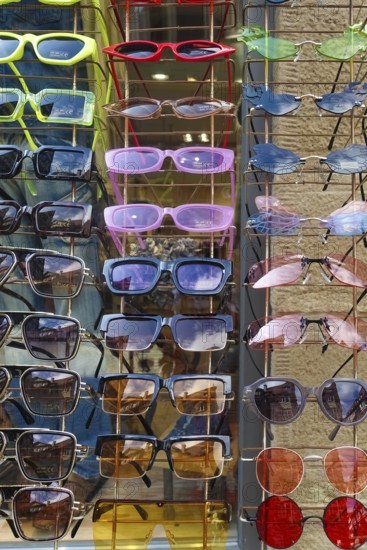 Colorful sunglasses, range of products, eyeglass holder, eyeglass stand, funny shapes, Tübingen, Baden-Württemberg, Germany