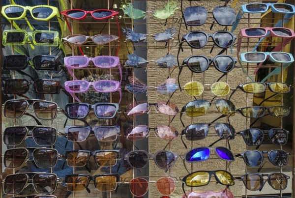 Colorful sunglasses, range of products, eyeglass holder, eyeglass stand, funny shapes, Tübingen, Baden-Württemberg, Germany