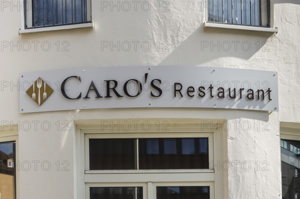 Caros restaurant, tavern, restaurant, sign, lettering, symbol forks, white house façade, Tübingen, Baden-Württemberg, Germany