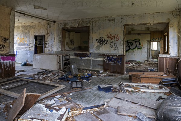 Abandoned room with old furniture and gravity in a building, dilapidated site of a former agricultural production cooperative of the former GDR, LPG, Lost Place, Müggenburg, Fischland-Darß-Zingst, Western Pomerania Lagoon Area National Park, Mecklenburg-Western Pomerania, Germany