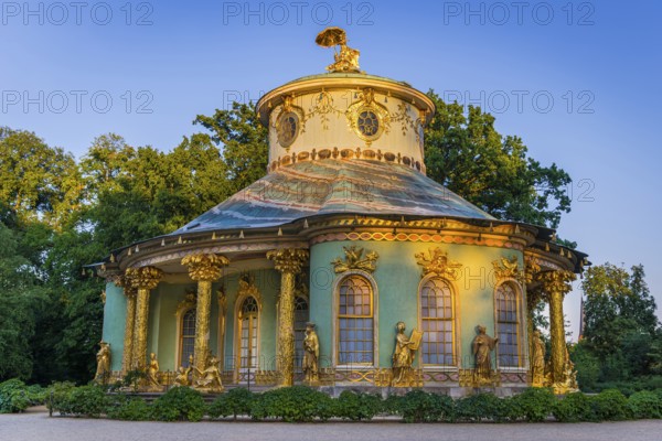 Chinese house in the evening light, tea house with golden sculptures, Sanssouci Park, Potsdam