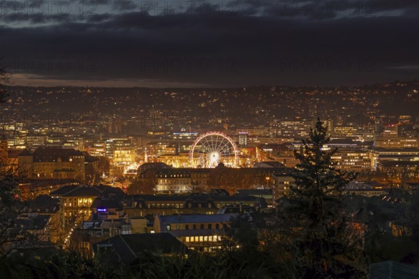 The view from above of the Stuttgart 2025 Christmas market shows a sea of festive lights and bustling stands that capture the city's winter atmosphere