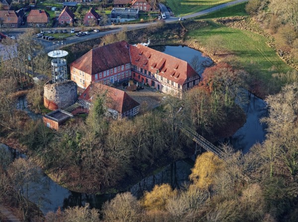 The Elbe Castle Bleckede, a two-wing palace complex and original lowland castle, on a medieval keep in Bleckede in the Lüneburg district of Lower Saxony. aerial view. Bleckede, Lower Saxony, Germany