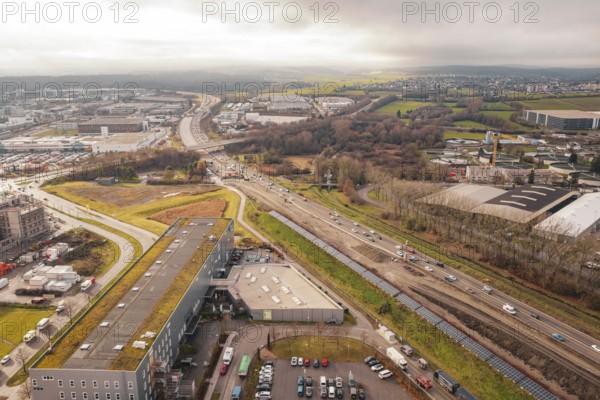 A81 and extensive landscape with roads and buildings under cloudy sky, Böblingen, Germany