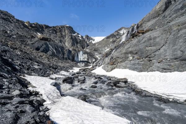 Glacier ice and glacier stream with waterfall, Worthington Glacier Glacier, Worthington Glacier State Recreational Site, Chugach Mountains, Alaska, USA