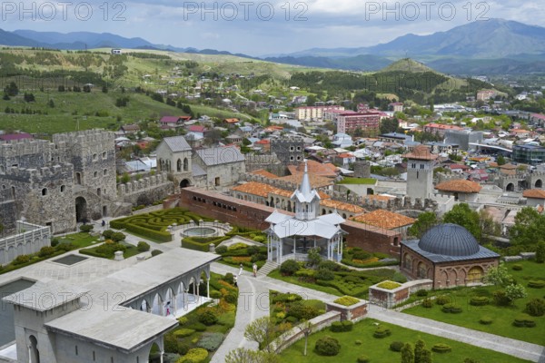 View of a castle with gardens surrounded by an urban landscape and hills in the background, Rabati Fortress, Akhaltsikhe, Samtskhe-Javakheti region, Samtskhe-Javakheti, Georgia