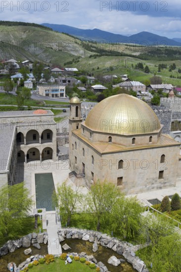 Mosque with golden dome and surrounding garden, nestled in a hilly landscape, Rabati Fortress, Akhaltsikhe, Samtskhe-Javakheti region, Samtskhe-Javakheti, Georgia