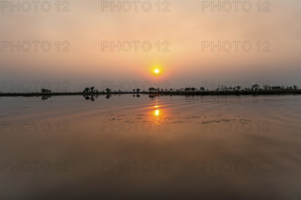 Lake at sunset, Xakanaxa Lagoon, Okavango Delta, Moremi Game Reserve, Botswana