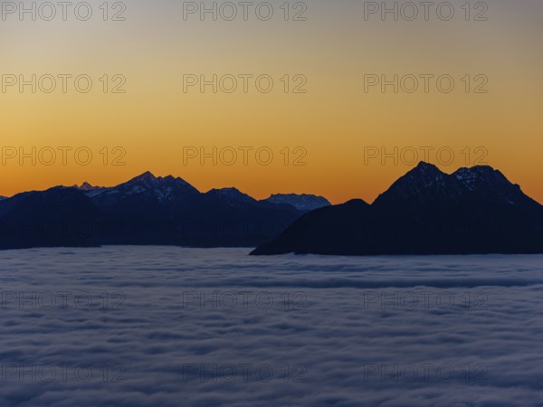 Dusk in the mountains, in the Fog Sea Valley, Chiemgau Alps, Upper Bavaria, Bavaria, Germany