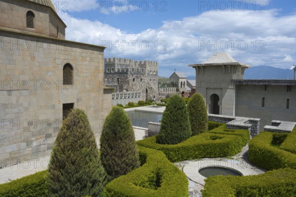 Medieval garden complex with hedges and towers against a clear, slightly cloudy sky, Rabati Fortress, Akhaltsikhe, Samtskhe-Javakheti region, Samtskhe-Javakheti, Georgia