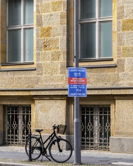 Blue poster with reference to the running route of the annual Berlin Marathon, Berlin, Germany