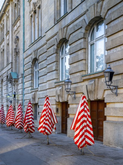 Red and white striped parasols on the back of the Deutsches Museum, Berlin, Germany