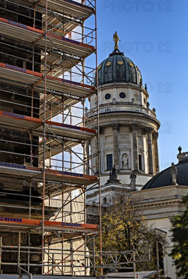 Scaffolding at Gendarmenmarkt with a view of the German Cathedral in the background, Berlin, Germany