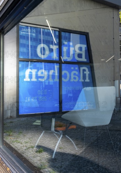 Reflection in shop windows, office space for rent, Berlin, Germany