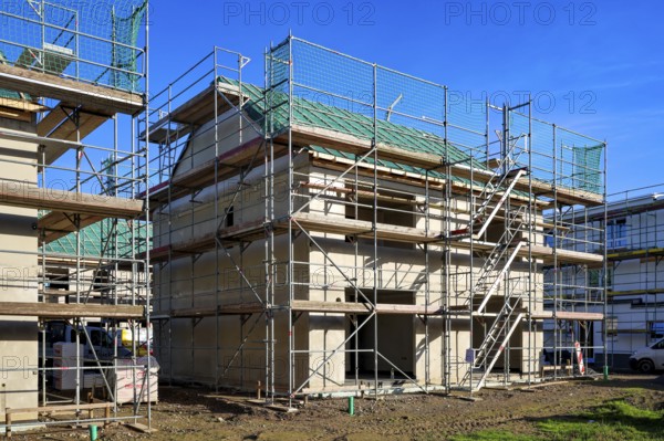 Castrop-Rauxel, North Rhine-Westphalia, Germany - residential construction in the Ruhr area. New construction district with semi-detached and terraced houses in the energy-saving KfW efficiency house standard 55
