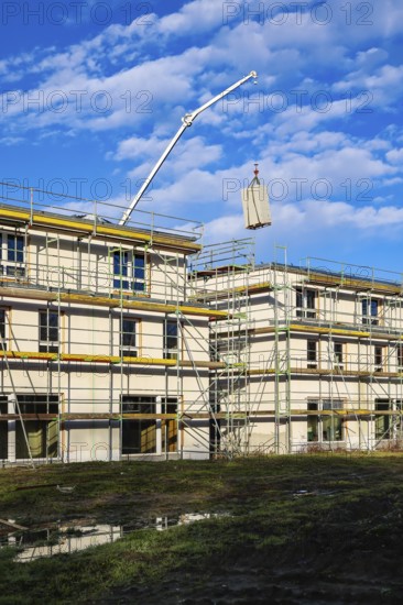 Castrop-Rauxel, North Rhine-Westphalia, Germany - residential construction in the Ruhr area. New construction district with semi-detached and terraced houses in the energy-saving KfW efficiency house standard 55