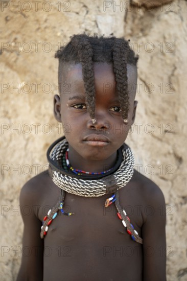 Young Himba girl, traditional Himba village, Kaokoveld, Kunene, Namibia