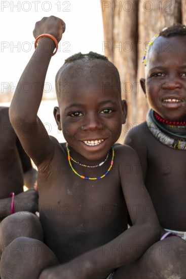 Portrait, funny Himba child, traditional Himba village, Kaokoveld, Kunene, Namibia
