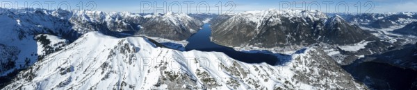 Aerial view, epic view of mountain landscape with snow in winter, summit of Bärenkopf, Achensee, Tyrol, Austria
