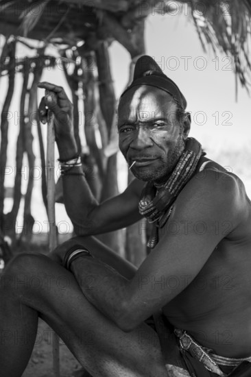 Elderly man, leader of the Himba, traditional Himba village, Kaokoveld, Kunene, Namibia