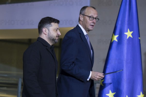 Volodymyr Zelensky (President of Ukraine) and Friedrich Merz (Chancellor of the Federal Republic of Germany) on their way to the press conference at the Federal Chancellery after the 8th German-Ukrainian Economic Forum, 15 August 2025