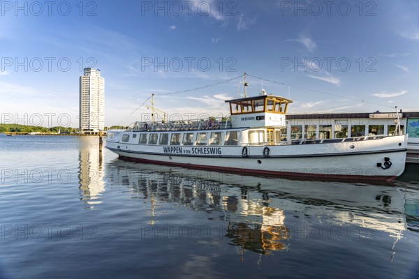 Excursion ship Wappen von Schleswig and the Viking Tower on the Schlei, City of Schleswig, Schleswig-Holstein, Germany