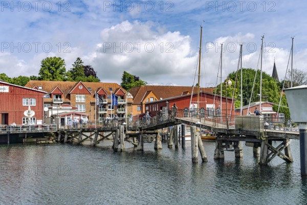 Eckernförde wooden bridge and the Siegfried shipyard at the inland port in Eckernförde, Schleswig-Holstein, Germany
