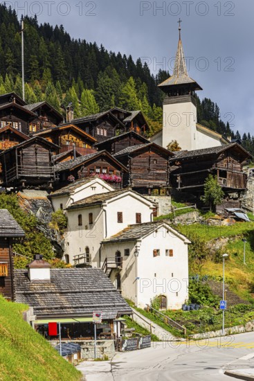 White cellars, historic farmhouses, Saint Theodule church, Grimentz, Val d'Anniviers, Valais Alps, Canton of Valais, Switzerland