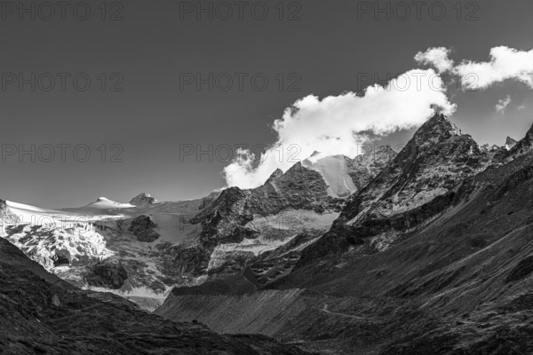 The Moiry glacier with the snow-capped peaks of the Grand Cornier, Tete Blanche and Pointe Moiry mountains, black and white photo, Val d'Anniviers, Valais Alps, Canton of Valais, Switzerland
