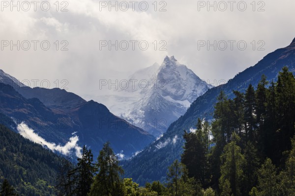 The summit of Mount Besso in fog, near Zinal, Val d'Anniviers, Valais Alps, Canton of Valais, Switzerland