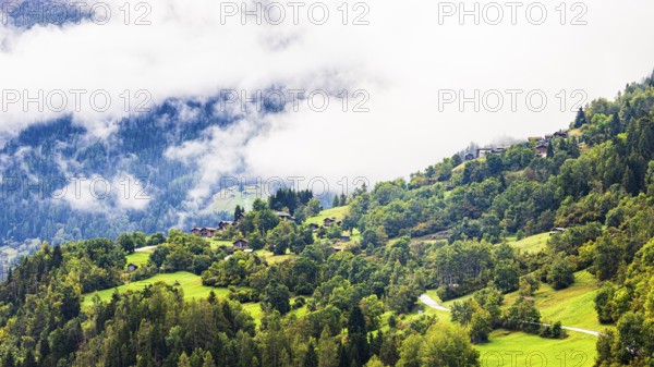 Fog rises in Val d'Anniviers, Valais Alps, Canton of Valais, Switzerland