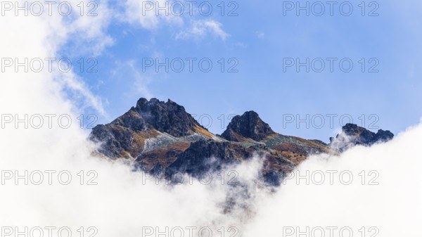 Mountain peaks rising out of fog, Val d'Anniviers, Valais Alps, Canton of Valais, Switzerland