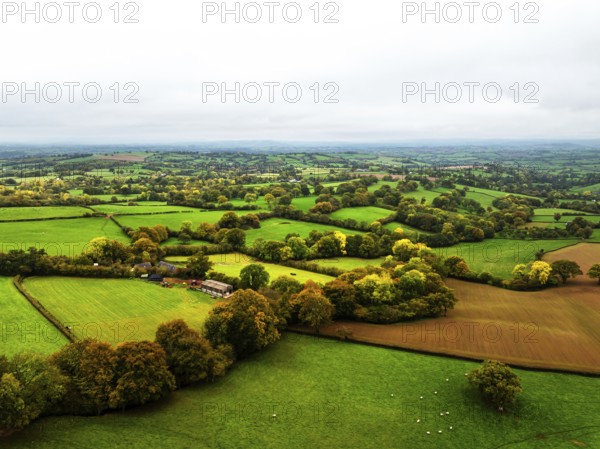 Autumn colours over Wales Farms and Fields from a drone, Grosmont, Abergavenny, Monmouthshire, Wales, UK