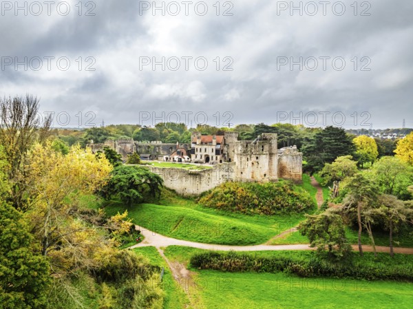 Autumn Colours over ruins of Caldicot Castle from a drone, Caldicot, Monmouthshire, Wales, UK