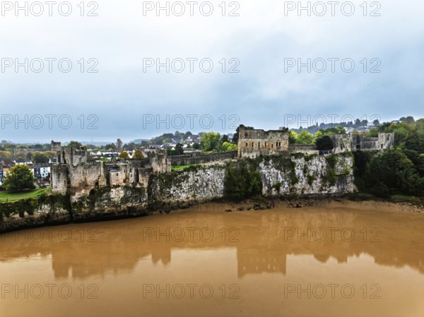 Autumn over Chepstow Castle and River Wye from a drone, Chepstow, Monmouthshire, Wales, UK