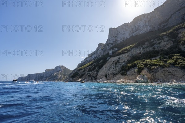 Picturesque rocky coast, cliffs and blue sea, Golfo di Orosei, Baunei, Sardinia, Italy