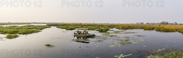 Safari by boat, tourists, Xakanaxa Lagoon, Okavango Delta, Moremi Game Reserve, Botswana