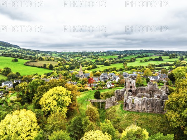Autumn Colours over ruins of Grosmont Castle from a drone, Grosmont, Monmouthshire, Wales, UK