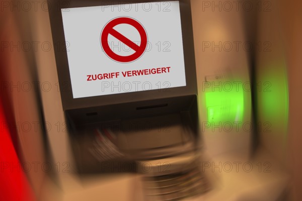 (photo montage) ATM with the display ACCESS DENIED