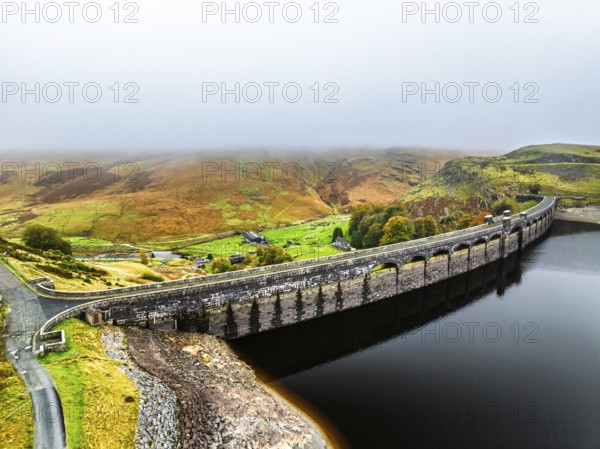 Autumn over Claerwen Dam, Claerwen Valley, Elan Valley Reservoir, Rhayader, Powys, Wales, UK