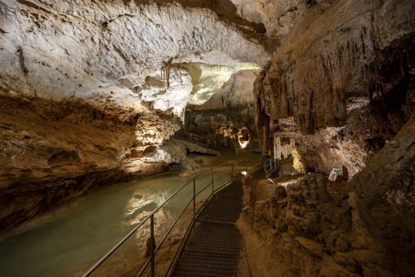 Stalactites and stalagmites, reflection in a small underground lake, rock formations in a stalactite cave, Grotta del Fico, Gulf of Orosei, Baunei, Sardinia, Italy