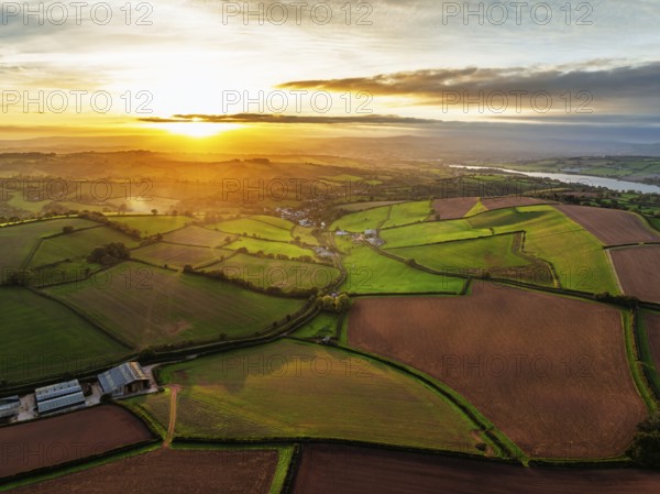 Colours of autumn Fields and Farms over Sheldon from a drone, Torbay, Devon, England, United Kingdom
