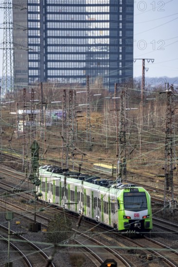 S-Bahn train on the route east, in front of Essen main station, town hall, regional transport North Rhine-Westphalia, Germany