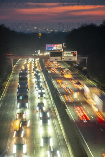 Evening traffic on the A52 motorway, between Düsseldorf and Essen, in front of the Breitscheid motorway junction, partly slow rush hour traffic, looking south, North Rhine-Westphalia, Germany