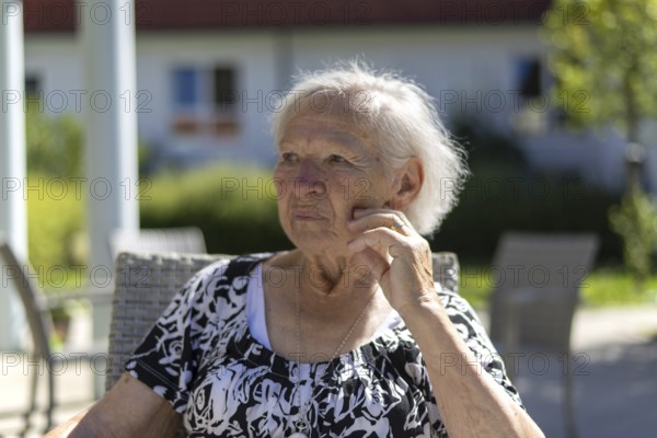 Thoughtful 86-year-old woman, retirement home, Jettingen, Baden-Württemberg, Germany