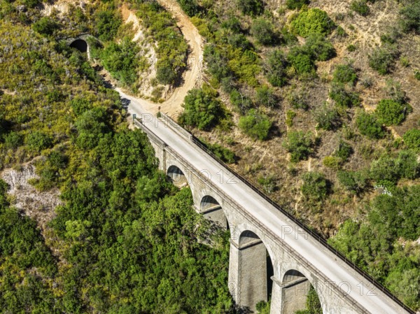 Cycle path Via Verde de la Sierra, Puerto Serrano to Olvera, old railroad track, cycle path on bridge, tunnel, near village Coripe, Andalusia, Spain