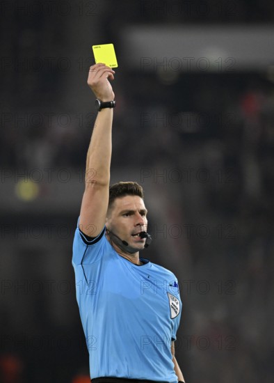 Referee Referee Marian Barbu (ROU) Gesture Gesture shows yellow card yellow caution Europa League, MHPArena, MHP Arena Stuttgart, Baden-Württemberg, Germany