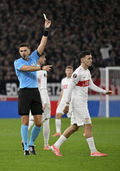 Referee Referee Marian Barbu (ROU) Gesture Gesture shows Bilal El Khannouss VfB Stuttgart (11) yellow card yellow caution Europa League, MHPArena, MHP Arena Stuttgart, Baden-Württemberg, Germany