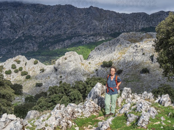 Hiking woman, mountain range Sierra de Grazalema, Parque natural de la Sierra de Grazalema, Andalusia, Spain